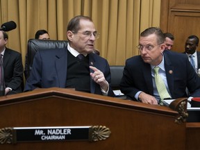 House Judiciary Committee Chair Jerrold Nadler, D-N.Y., joined at right by Ranking Member Doug Collins, R-Ga., prepares for the start of a hearing on The Equality Act, a comprehensive nondiscrimination bill for LGBT rights, on Capitol Hill in Washington, Tuesday, April 2, 2019. Nadler is preparing subpoenas seeking special counsel Robert Mueller's full Russia report as the Justice Department appears likely to miss an April 2 deadline set by Democrats for the report's release.