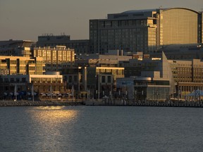 This Feb. 17, 2012 photo shows the National Harbor, a multi-use waterfront development along the Potomac River in Prince George's County, Md. A Maryland man accused of planning an Islamic State-inspired attack at the shopping and entertainment complex near Washington, D.C., pleaded not guilty on Monday, April 29, 2019, to a federal criminal charge. Rondell Henry, of Germantown, was arraigned on one count of interstate transportation of a stolen vehicle. He was indicted April 10 on the charge, which carries a maximum sentence of 10 years in prison. Henry allegedly stole a U-Haul van in Virginia and parked it at the National Harbor. Police arrested him the next morning after they found the van and saw Henry jump over a security fence from the boat deck.