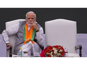 In this Monday, April 8, 2019, photo, India's Prime Minister Narendra Modi releases Bharatiya Janata Party or BJP's manifesto for the upcoming general elections in New Delhi, India. Modi came to power in 2014 promising big-ticket economic reforms. But with unemployment rising and signature policies getting panned, Modi's Bharatiya Janata Party has adopted a nationalist pitch ahead of a general election that begins this week.