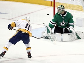 Nashville Predators center Kyle Turris (8) has his shot deflected by Dallas Stars' Ben Bishop (30) in the third period of Game 6 in an NHL hockey first-round playoff series in Dallas, Monday, April 22, 2019.