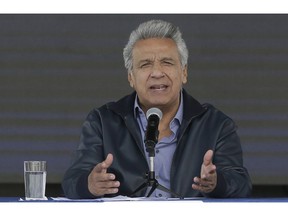 Ecuador's President Lenin Moreno speaks during the inauguration of the "Agua Para Todos" or "Water for Everyone" government program, in Latacunga, Ecuador, Thursday, April 11, 2019.  Moreno said in a video posted on Twitter Thursday that he revoked the political asylum for Wikileaks founder Julian Assange due to "repeated violations to international conventions and daily-life protocols."