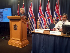 BC provincial health officer Bonnie Henry speaks at a news conference as Victoria Police Chief Del Manak looks on in Victoria on Wednesday, April 24, 2019.