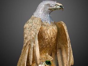 A golden eagle sculpture is shown in a handout photo from Delta Police. A major insurance company is fighting back after a British Columbia court required it to make good on a policy covering a gold, diamond-encrusted eagle statue allegedly stolen in Metro Vancouver more than two years ago.