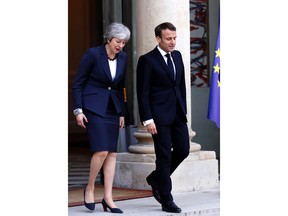 British Prime Minister Theresa May leaves after a meeting with French President Emmanuel Macron at the Elysee Palace in Paris Tuesday, April 9, 2019. The French presidency said all decisions on Brexit will be made on Wednesday at a summit of EU leaders in Brussels.