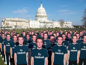 Cardboard cutouts of Facebook founder and CEO Mark Zuckerberg stand outside the U.S. Capitol in Washington, D.C., on April 10, 2018.