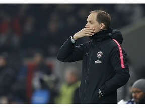 PSG's coach Thomas Tuchel watches his team during the French League One soccer match between OSC Lille and Paris Saint-Germain at Stade Pierre Mauroy in Lille, France, Sunday, April 14, 2019.