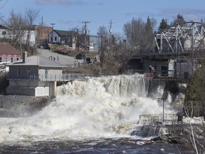 Dam in downtown Bracebridge Ontario can't hold back the swollen waters of the Muskoka River on Sunday, April 28, 2019.