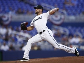 Miami Marlins starting pitcher Caleb Smith delivers during the first inning of a baseball game against the New York Mets, Monday, April 1, 2019, in Miami.