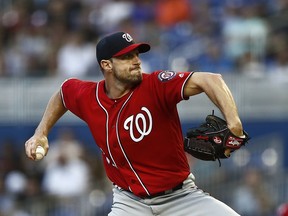 Washington Nationals starting pitcher Max Scherzer (31) delivers during the first inning of a baseball game against the Miami Marlins on Saturday, April 20, 2019, in Miami.