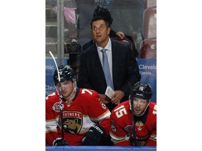 Florida Panthers Head coach Bob Boughner watches a replay during the third period of an NHL hockey game against the New Jersey Devils, Saturday, April 6, 2019, in Sunrise, Fla. The Devils defeated the Panthers 4-3 in overtime.