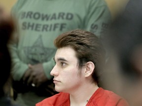 Parkland school shooting suspect Nikolas Cruz listens in court for a defense motion at the Broward Courthouse in Fort Lauderdale, Fla., Thursday, April 18, 2019. Cruz is accused of killing 17 and wounding 17 in the February 2018 mass shooting at Marjory Stoneman Douglas High School in Parkland, Fla.