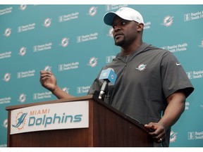 Miami Dolphins head coach Brian Flores speaks at a news conference during voluntary minicamp at the Miami Dolphins NFL football training facility, Tuesday, April 16, 2019, in Davie, Fla.