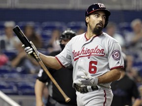Washington Nationals' Anthony Rendon reacts after striking out during the first inning of a baseball game against the Miami Marlins, Friday, April 19, 2019, in Miami.