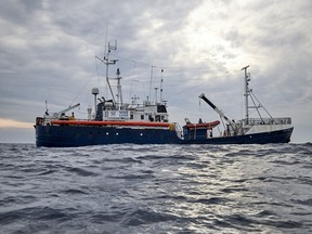 The Sea-Watch rescue ship sails in the waters off Libya Wednesday, April 3, 2019. The German humanitarian group Sea-Watch says the ship it operates in the central Mediterranean Sea has rescued 64 migrants in waters off Libya. Sea-Watch wrote Wednesday on Twitter that the people brought to safety from a rubber dinghy included 10 women, five children and a newborn baby. The group said it carried out the rescue off the coast of Zuwarah after Libyan authorities couldn't be reached. Sea-Watch is asking Italy or Malta to open a port to the rescue ship, the Alan Kurdi.