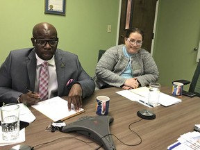 Marcus Sanders, left, and Megan Mackiernan are shown during a meeting of the Alaska State Commission for Human Rights on Thursday, April 18, 2019, in Anchorage, Alaska. Mackiernan was elected chairman and Sanders was elected vice chair after recent departures left the commission without members in those positions.
