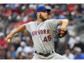 New York Mets' Zack Wheeler pitches against the Atlanta Braves during the first inning of a baseball game Friday, April 12, 2019, in Atlanta.