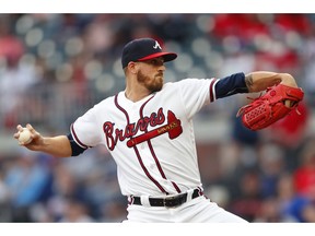 Atlanta Braves starting pitcher Kevin Gausman works in the first inning of a baseball game against the New York Mets on Thursday, April 11, 2019, in Atlanta.