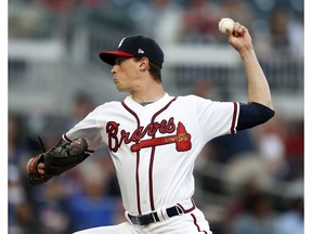 Atlanta Braves starting pitcher Max Fried (54) works in the first inning of a baseball game against the Arizona Diamondbacks, Tuesday, April 16, 2019, in Atlanta.