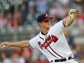 Atlanta Braves starting pitcher Mike Soroka works against the San Diego Padres in the first inning of a baseball game Monday, April 29, 2019, in Atlanta.