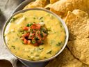 Queso – more formerly known as chile con queso – is a Tex-Mex staple.