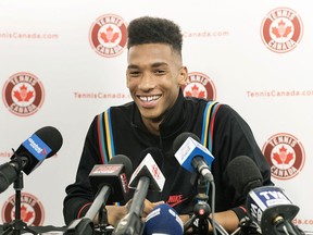 Canadian tennis player Felix Auger-Aliassime speaks to reporters during a news conference in Montreal, Tuesday, April 2, 2019.