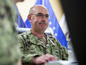 In this Wednesday, April 17, 2019, file photo reviewed by U.S. military officials, U.S. Navy Rear Adm. John Ring, Joint Task Force Guantanamo Commander, pauses while speaking during a roundtable discussion with the media, at Guantanamo Bay Naval Base, Cuba.