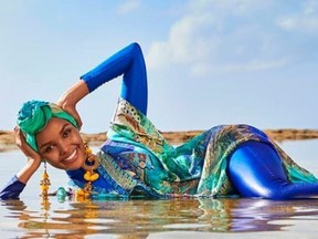 Aden referred to herself as a “burkini babe” in a video shared on Twitter by the magazine and called her appearance in Sports Illustrated “a dream come true.”