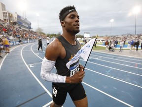 Indian Hills' Kenny Bednarek walks off the track after winning the men's special 200-meter dash at the Drake Relays athletics meet, Friday, April 26, 2019, in Des Moines, Iowa.