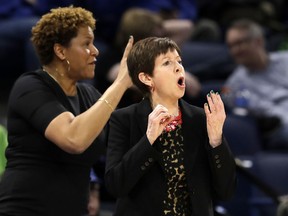 Notre Dame head coach Muffet McGraw directs her team during the first half of a regional championship game against Stanford in the NCAA women's college basketball tournament, Monday, April 1, 2019, in Chicago.
