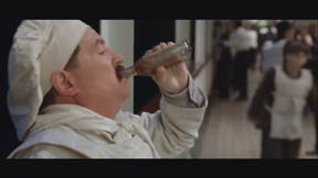 Still of a deleted scene from the 1997 blockbuster Titanic, showing Charles Joughin having a swig of whiskey.