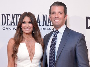 Donald Trump, Jr. and Kimberly Guilfoyle attend the DC premiere of the film, "Death of a Nation," at E Street Cinema on August 1, 2018 in Washington, DC.