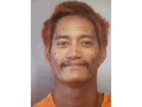 This undated booking photo provided by the Hawaii Department of Public Safety shows Barret Paman. Paman is one of two inmates who escaped from a Maui jail Sunday, April 14, 2019. He and Troy Diego escaped from Maui Community Correctional Center. Authorities say staff members later noticed a broken door in the back of a dorm building. Paman later turned himself in to Maui police. He's awaiting trial for burglary, theft and firearms charges. Diego remained missing Monday, April 15, 2019. He's awaiting trial for theft and unauthorized entry into a vehicle. (Hawaii Department of Public Safety via AP)