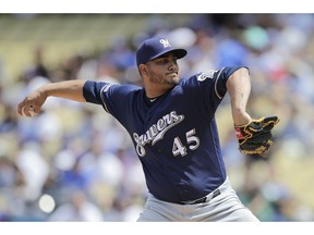 Milwaukee Brewers starting pitcher Jhoulys Chacin throws against the Los Angeles Dodgers during the first inning of a baseball game, Sunday, April 14, 2019, in Los Angeles.