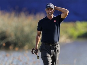 Adam Scott walks on the 18th green during the first round of the PGA Zurich Classic golf tournament at TPC Louisiana in Avondale, La., Thursday, April 25, 2019.