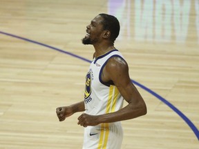 Golden State Warriors' Kevin Durant reacts after making a three-point basket during the first half in Game 6 of a first-round NBA basketball playoff series against the Los Angeles Clippers Friday, April 26, 2019, in Los Angeles.