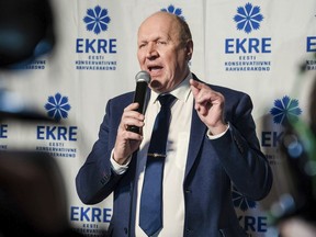 FILE - In this Monday, March 4, 2019 file photo, Chairman of the Estonian Conservative People's Party (EKRE) Mart Helme speaks at the headquarters after parliamentary elections in Tallinn, Estonia. The father-and-son leaders of a divisive anti-immigrant party were sworn in Monday April 29, 2019 as Estonia's interior and finance minister. EKRE's Mart Helme was appointed interior minister in the Cabinet, while his son Martin becomes finance minister.