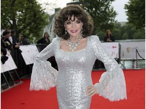 FILE - In this Sunday, May 14, 2017 file photo, Joan Collins poses for photographers upon arrival to the British Academy Television Awards at the Royal Festival Hall in London. Joan Collins has thanked firefighters for their quick response after a blaze erupted in her London apartment. The 85-year-old actress on Monday, April 15, 2019 shared video images of a charred wall on social media after the weekend fire. She also tweeted thanks to the "marvelous" firefighters who tackled the "terrifying" blaze.