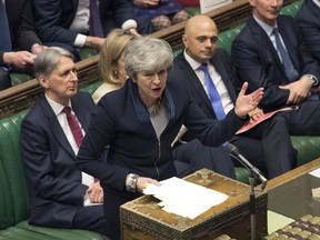 In this photo provided by the UK Parliament, Britain's Prime Minister Theresa May addresses MP's in the Palace of Westminster in London, Wednesday, April 3, 2019. A Brexit-related vote in Britain's House of Commons on Wednesday ended in a tie, the first time that has happened in a quarter-century. Under Parliament's rules, the speaker of the House has tie-breaking power. Speaker John Bercow cast his vote with the noes. He said that was in keeping with the principle that "it is not for the chair to create a majority that otherwise doesn't exist."