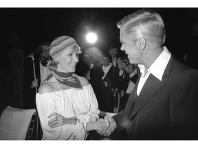FILE - In this May 25, 1978 file photo, Swedish actress Bibi Andersson meets George Peppard at a party for the announcement of start of new U.S. film "Cabo Blanco". Sweden's Film Institute says Bibi Andersson, the Swedish actress who played in films by fellow countryman filmmaker Ingmar Bergman, died on Sunday April 14, 2019. She was 83.