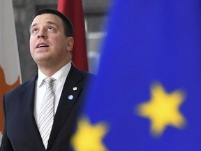 FILE - In this file photo dated Thursday, Dec. 13, 2018, Estonian Prime Minister Juri Ratas arrives for an EU summit in Brussels. The Estonian Conservative People's Party, or EKRE, said Saturday April 6, 2019, it will form a three-way majority government with the centrist Center Party and the conservative Fatherland party, and the Cabinet would be led by Center Party leader, ex-Prime Minister Juri Ratas.