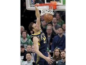 Indiana Pacers forward Bojan Bogdanovic (44) slams a dunk against the Boston Celtics during the first quarter of Game 2 of an NBA basketball first-round playoff series, Wednesday, April 17, 2019, in Boston.