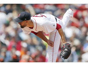 Boston Red Sox's Rick Porcello follows through with a pitch during the first inning of a baseball game against the Baltimore Orioles in Boston, Saturday, April 13, 2019.