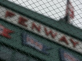 Mist collects on the netting at Fenway Park in Boston, Friday, April 26, 2019. The scheduled baseball game between the Boston Red Sox and the Tampa Bay Rays was postponed due to inclement weather.