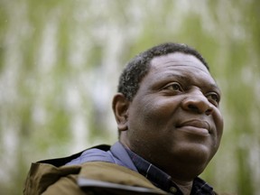 In this Monday, April 22, 2019 photo Goldman Environmental Prize winner Alfred Brownell, a Liberian environmental lawyer and human rights activist, stands for a photograph, in Boston. Brownell, a distinguished scholar at Northeastern University School of Law in Boston, says he was forced to flee his country over his fight to hold a Southeast Asian palm oil company accountable for its alleged destruction of Liberian forest and abuse of indigenous communities living around palm oil plantations.