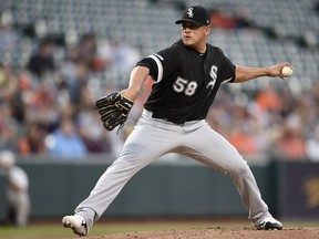 Chicago White Sox pitcher Manny Banuelos delivers against the Baltimore Orioles in the first inning of a baseball game, Monday, April 22, 2019, in Baltimore.