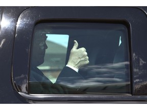 President Donald Trump gives thumbs up as his motorcade arrives near Air Force One at Andrews Air Force Base, Md., Monday, April 15, 2019. Trump is heading to Minnesota to tout the 2017 tax law.