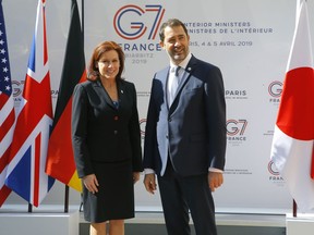 U.S. Homeland Security official Claire Grady, left, is welcomed by French Interior Minister Christophe Castaner for a G7 meeting at ministerial level in Paris, Thursday April 4, 2019. Foreign and interior ministers from the Group of Seven are gathering in France this week to try to find ambitious solutions to world security challenges. Putting a dampener on that are two glaring American absences: U.S. Secretary of State Mike Pompeo and Homeland Security Secretary Kirstjen Nielsen.