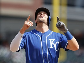 Kansas City Royals' Hunter Dozier looks skyward after hitting a two-run home run during the seventh inning of a baseball game against the Detroit Tigers, Saturday, April 6, 2019, in Detroit.