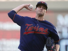 Minnesota Twins pitcher Jake Odorizzi throws against the Houston Astros in the first inning of a baseball game Monday, April 29, 2019, in Minneapolis.