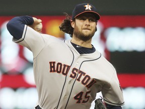 Houston Astros pitcher Gerrit Cole throws against the Minnesota Twins in the first inning of a baseball game Tuesday, April 30, 2019, in Minneapolis.